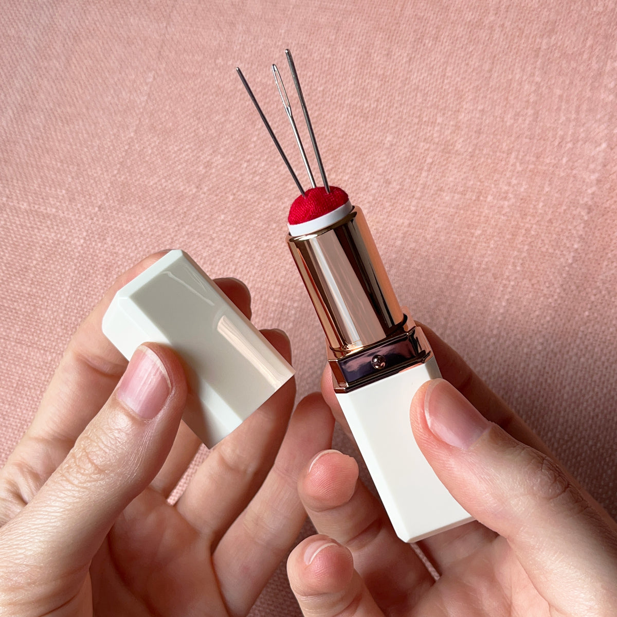 Lipstick needle holder