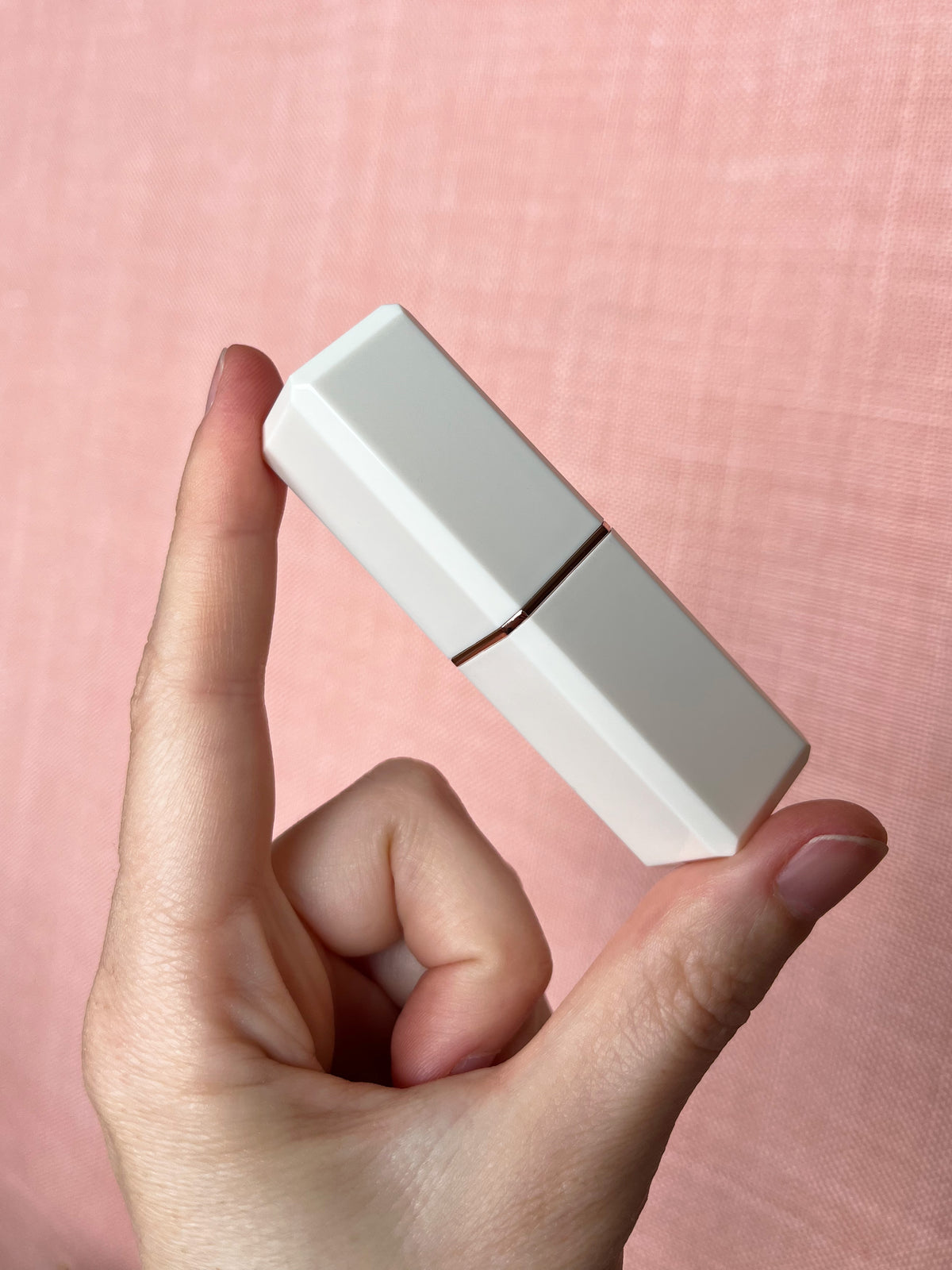 Lipstick needle holder